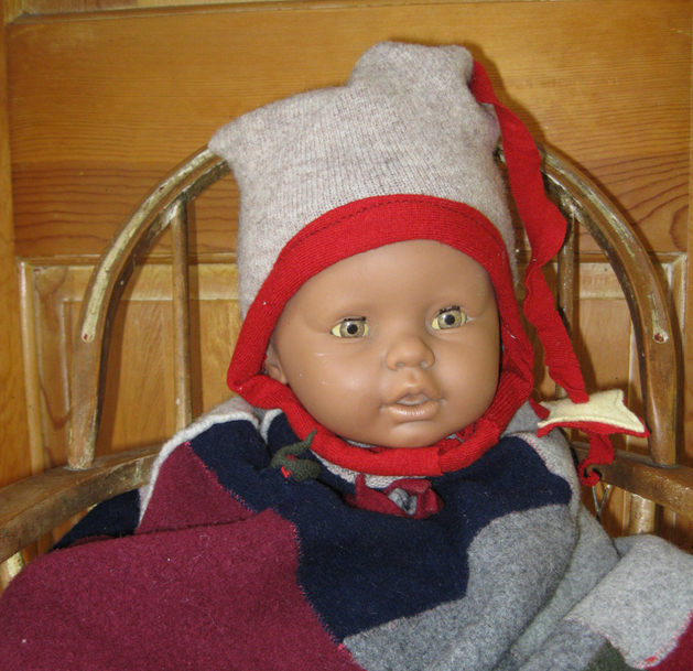 Wool “Won’t Come Off” Baby Helmet from a Sweater Sleeve